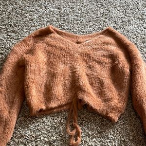 Fuzzy burnt orange cropped sweater. Size: S